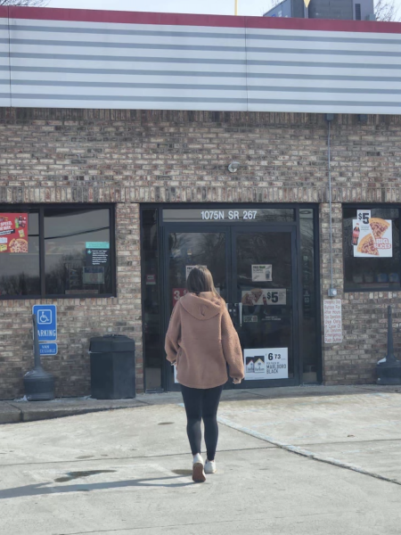 Senior Addie Crowe walks into a gas station while working undercover to buy alcohol.